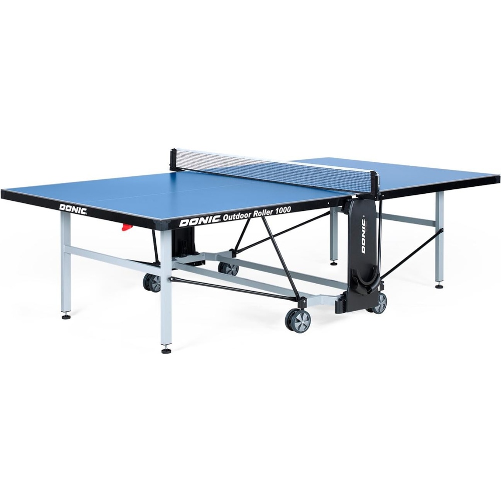 Стіл тенісний DONIC Outdoor Roller 1000 Blue (230291) Додатково складана конструкція; осередки для зберігання ракеток та м'ячів; 4 транспортувальні колеса Ø 128 мм з гумовим протектором; стільниця із водостійкого меламіну 6 мм; металева окантовка 50 мм