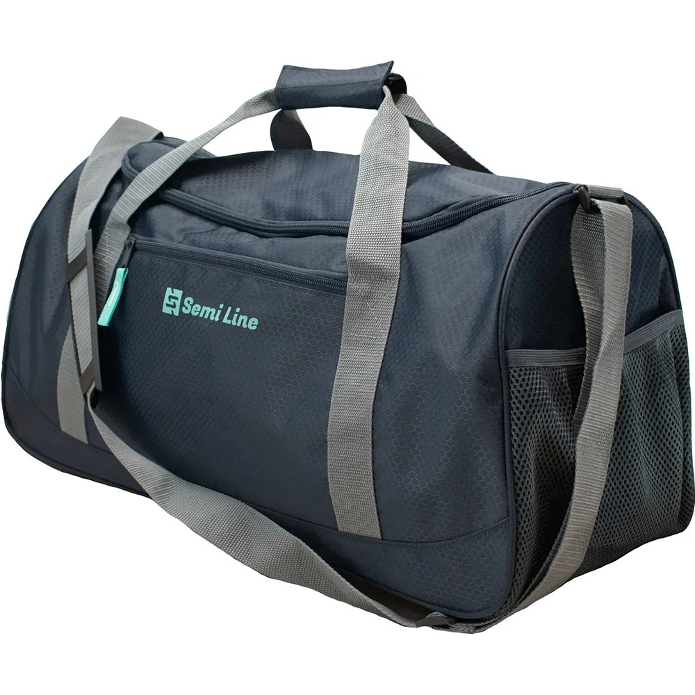 Дорожня сумка SEMI LINE 40 Navy/Grey (A3043-4) Дорожня сумка SEMI LINE 40 Navy/Grey (A3043-4) Додатково вологостійкий, додатково укріплений матеріал; три бічні місткі кишені; широкі міцні ручки з'єднані застібкою на липучці; плечовий ремінь має довжину 137 см, і довгу плаваючу центральну вставку