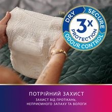 Труси-підгузки TENA Lady Pants Plus 4x9p Creme East для жінок (7322540920772)