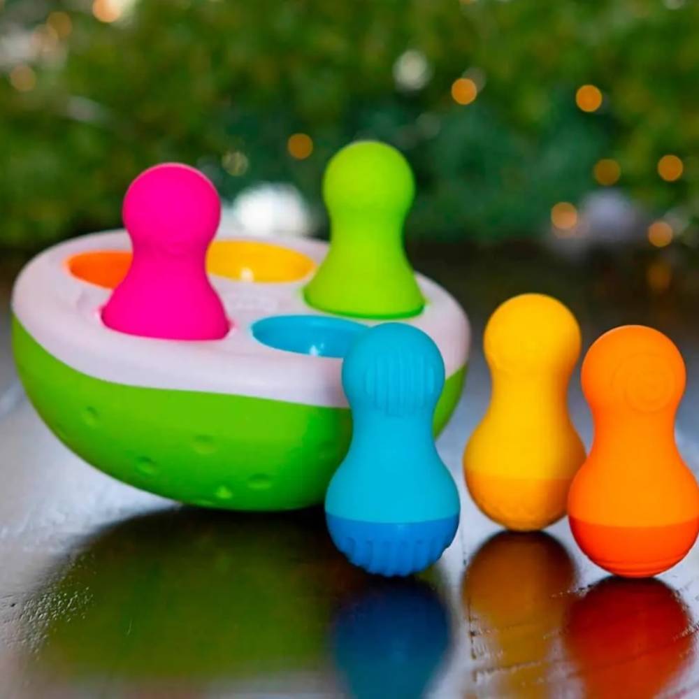 Сортер-балансир Fat Brain Toys Spinny Pins Неваляшки (F248ML) Особливості звукові ефекти