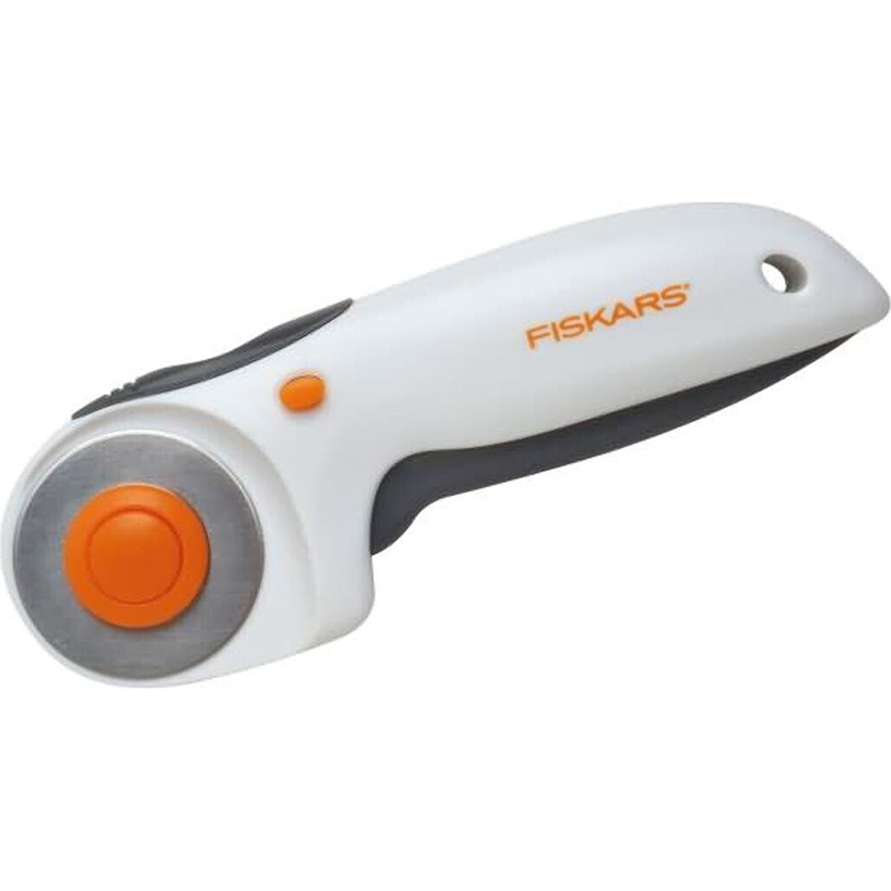 Різак роторний FISKARS Trigger 45мм (1003910) Додатково автоматичне втягування леза, кнопка блокування леза, підходить для правшів та шульг, ергономічна рукоятка