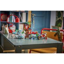 Конструктор LEGO Ninjago Автомобильная битва ниндзя у дома на дереве 642 элемента (71857)