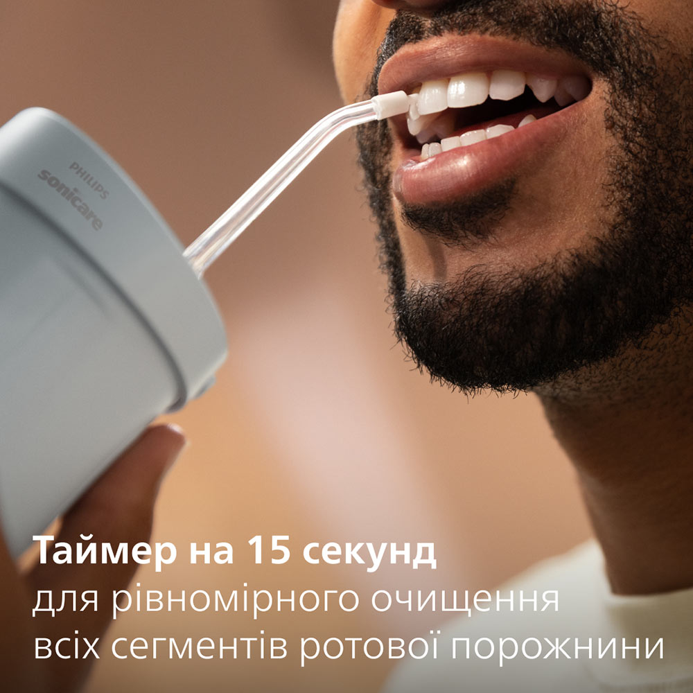 Іригатор PHILIPS Sonicare HX3333/24 Compact Flosser 1000 — фото 3